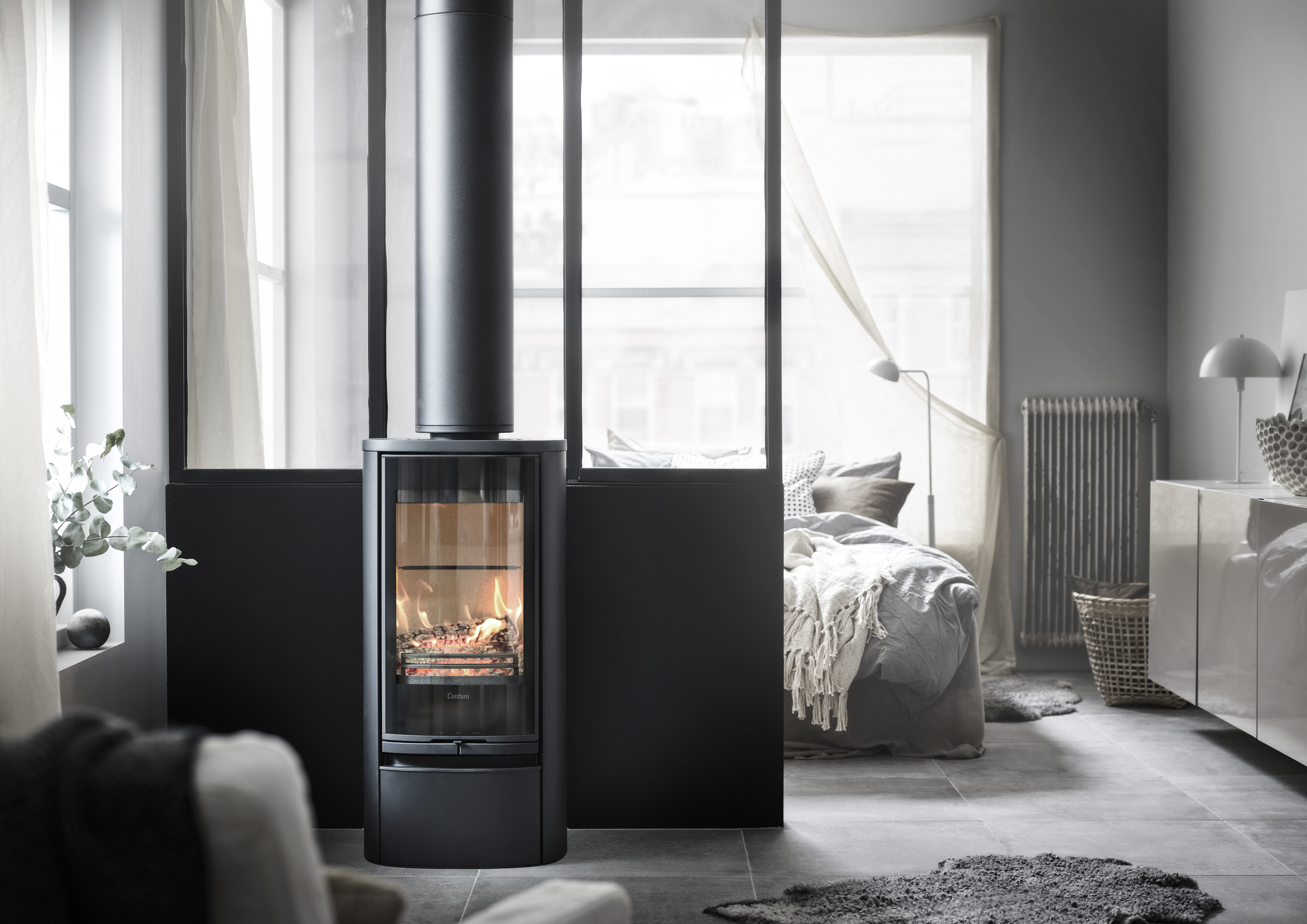 An example of a log burner in a bedroom. Home Statements