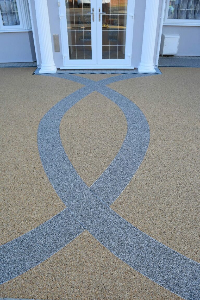 An example of a resin bound driveway with feature pattern, installed by Home Statements