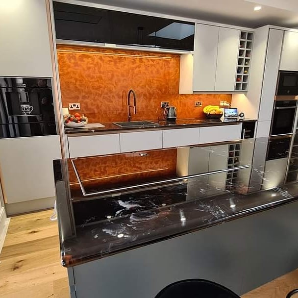 An example of an epoxy resin worktop and epoxy resin splashback in a kitchen, by Home Statements