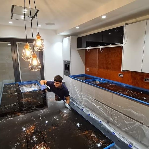 An example of an epoxy resin worktop and epoxy resin splashback in a kitchen, by Home Statements
