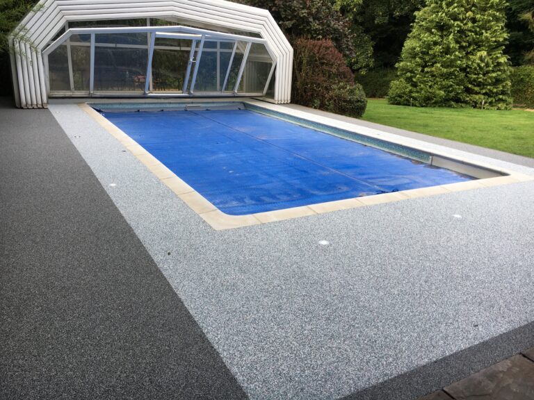 An example of a resin bound swimming pool surround, installed by Home Statements