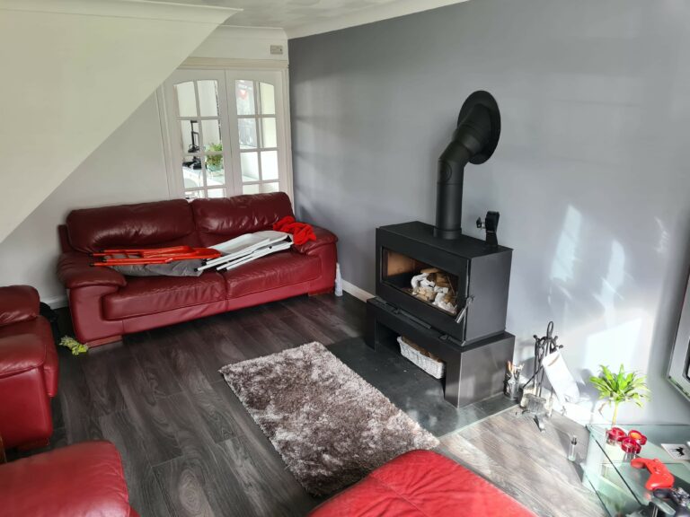 Image of log burner in a living room.