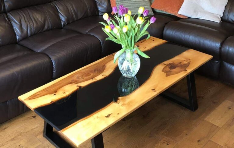 An example of an epoxy resin river table in Sevenoaks, in a living room, by Home Statements