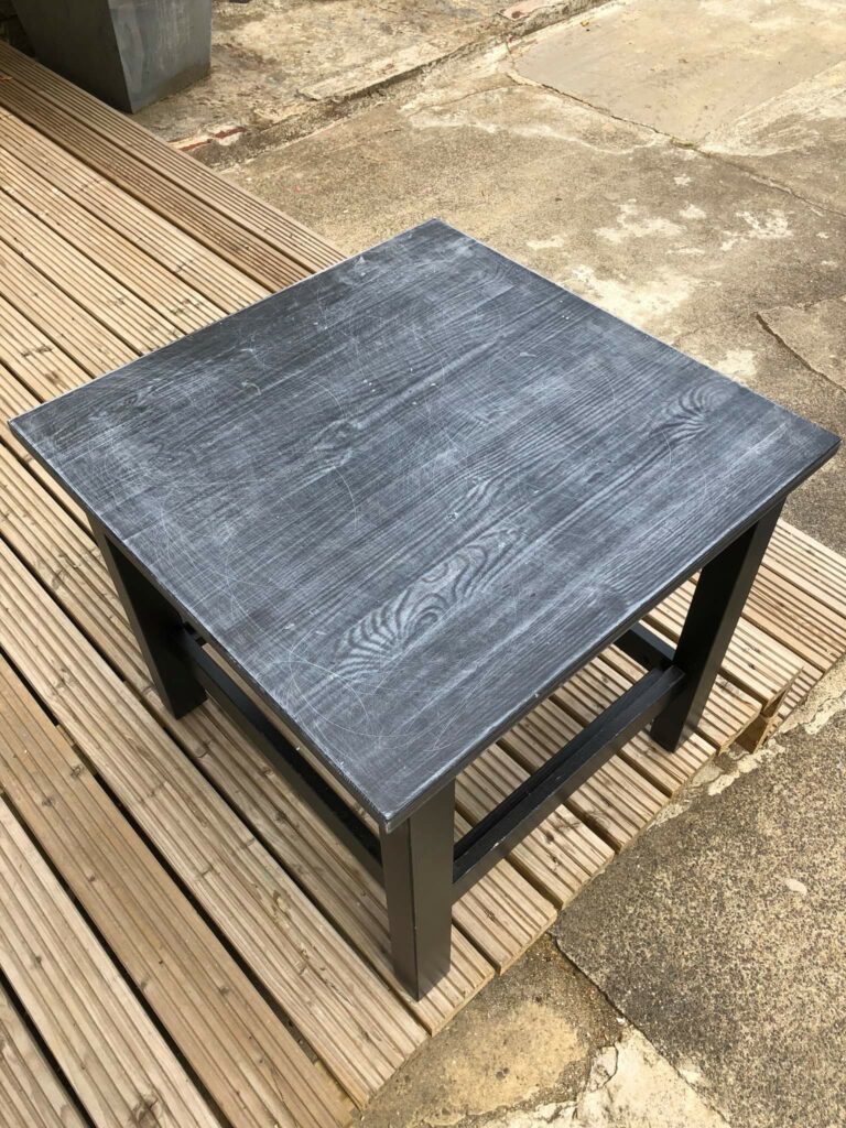 An example of a table before being resurfaced with an epoxy resin design, by Home Statements