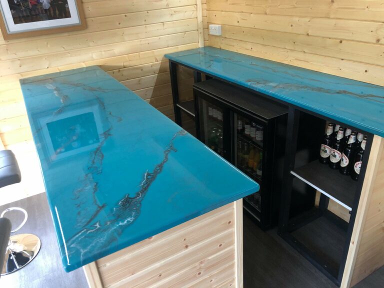 An example of an epoxy resin home bar top near maidstone in a man cave, by Home Statements