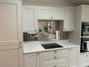 An example of an antique mirror splashback in a kitchen, Home Statements