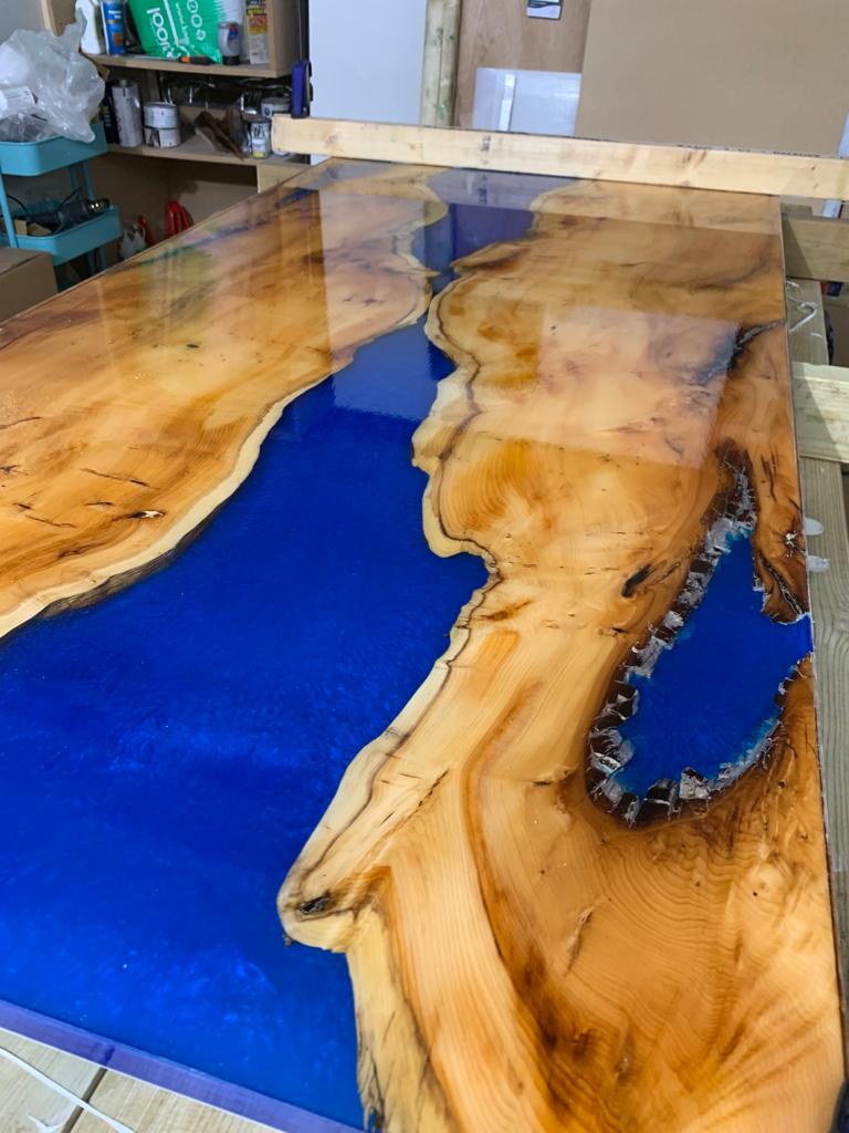 An example of epoxy resin river table in Kent, Home Statements