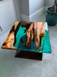 An example of an epoxy resin river table in a living room, Home Statements