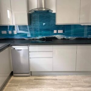 An example of a unique kitchen splashback in a kitchen, by Home Statements Ltd