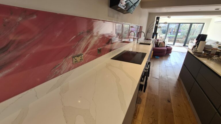 An example of a pink epoxy resin kitchen splashback in a kitchen, by Home Statements Ltd