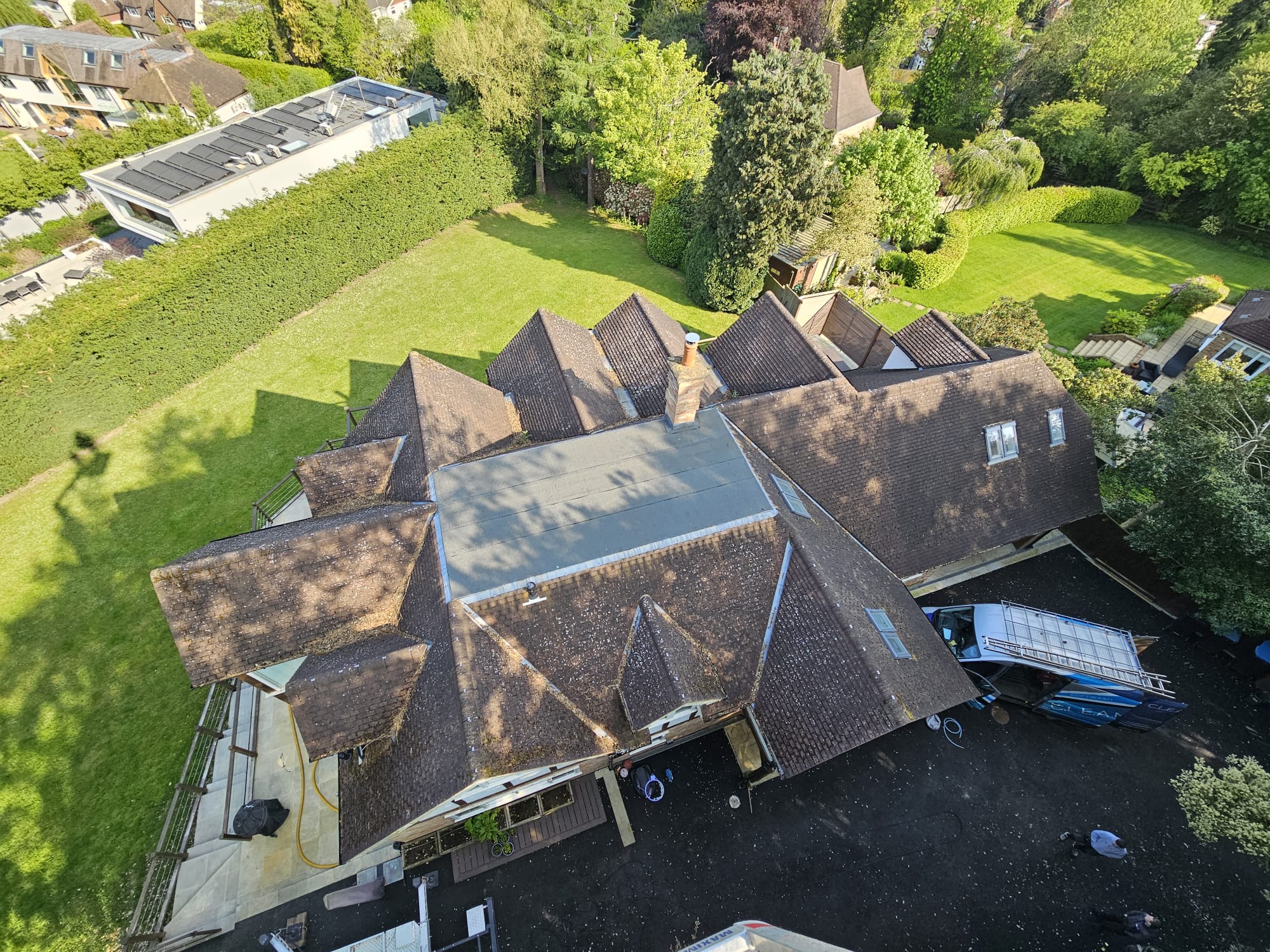 An example of roof clean and moss removal in Surrey by Home Statements Ltd
