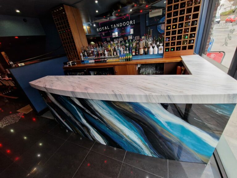 an example of a commercial epoxy resin bar top and front panel in Croydon by Home Statements Ltd