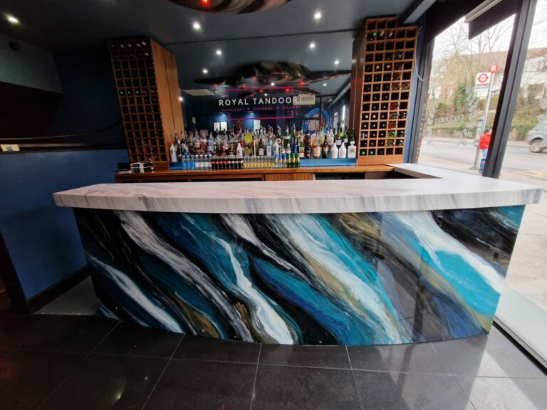 an example of a commercial epoxy resin bar top and front panel in Croydon by Home Statements Ltd