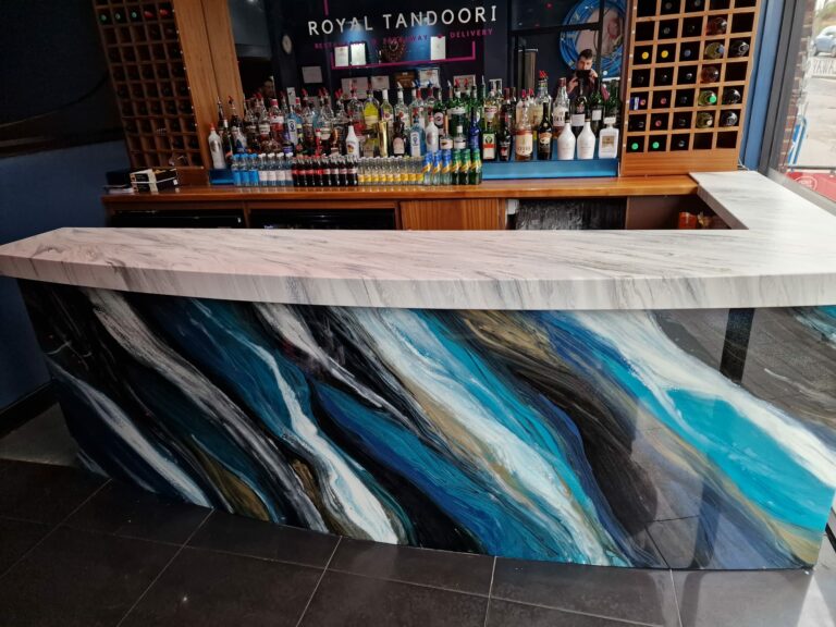 an example of a commercial epoxy resin bar top and front panel in Croydon by Home Statements Ltd