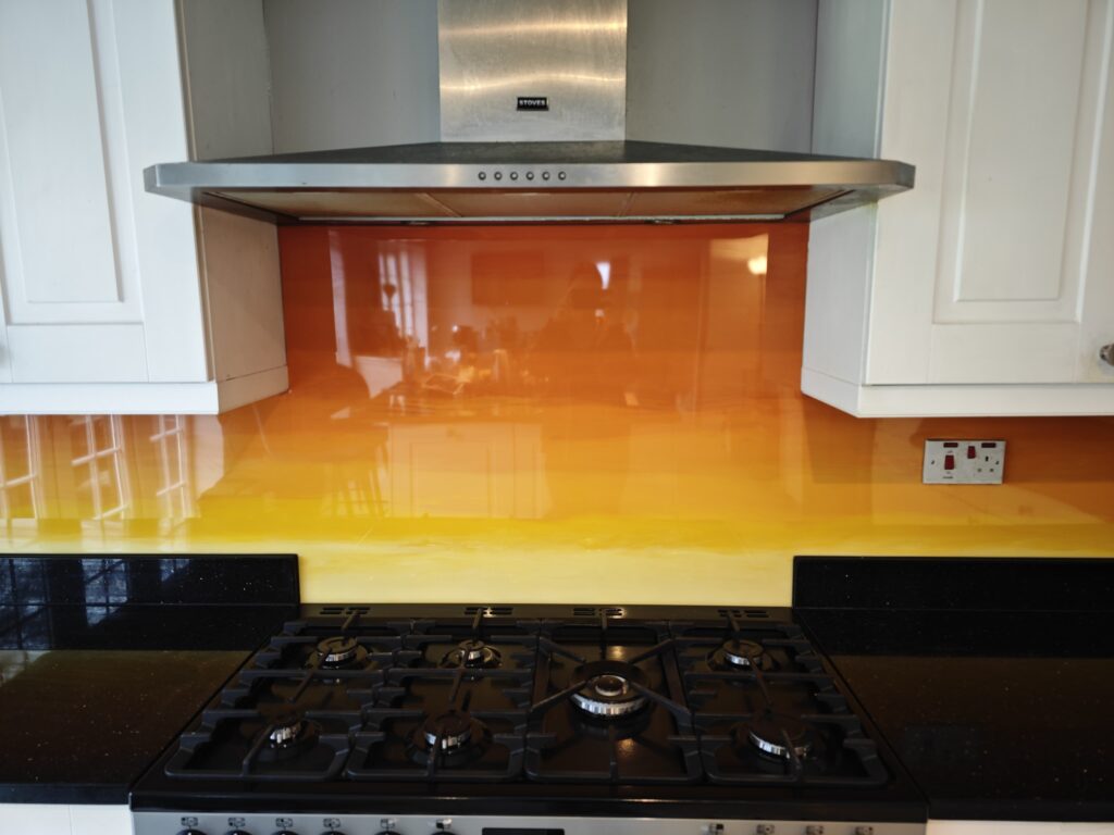 an example of an ombre style epoxy resin design kitchen splashback by Home Statements Ltd