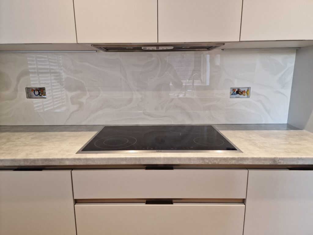 an example of an epoxy resin kitchen splashback created in a kitchen by Home Statements Ltd
